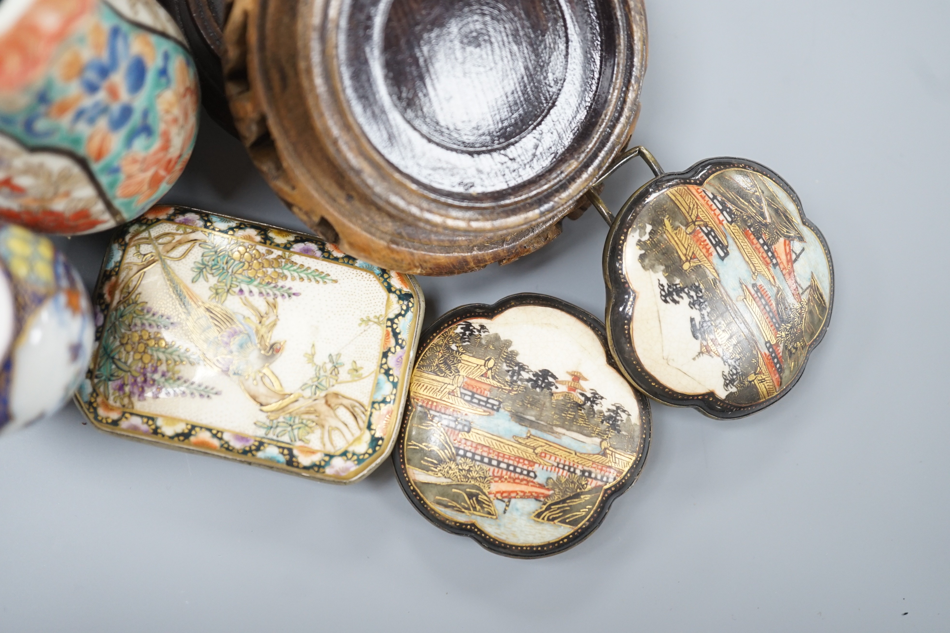 A group of Japanese small or miniature Kutani and Imari vessels and three Satsuma pottery mounted brooches, largest 11.7cm